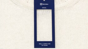 Electroluxin koneella hyvin hoidettu valkoinen villapaita