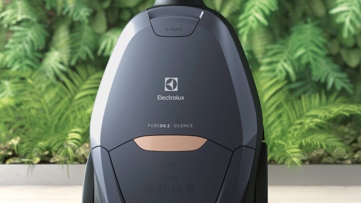 Electroluxin pölynimuri ja vihreä tausta