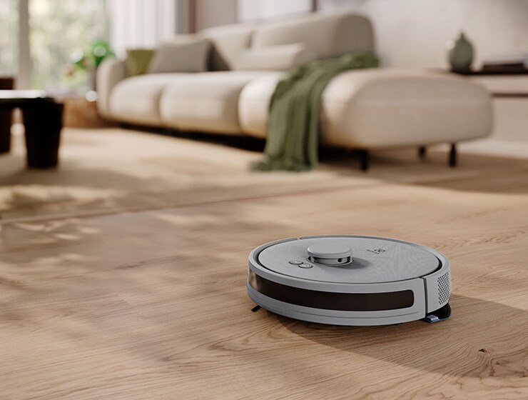 Robotti-imuri lattialla