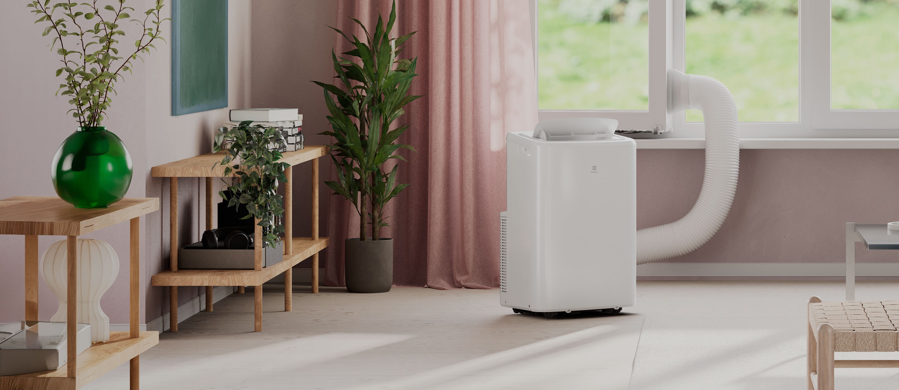 Kompakti, kannettava Electrolux-ilmastointilaite, joka viilentää huoneen tehokkaasti ja johtaa lämpimän ilman ulos poistoputken kautta.
